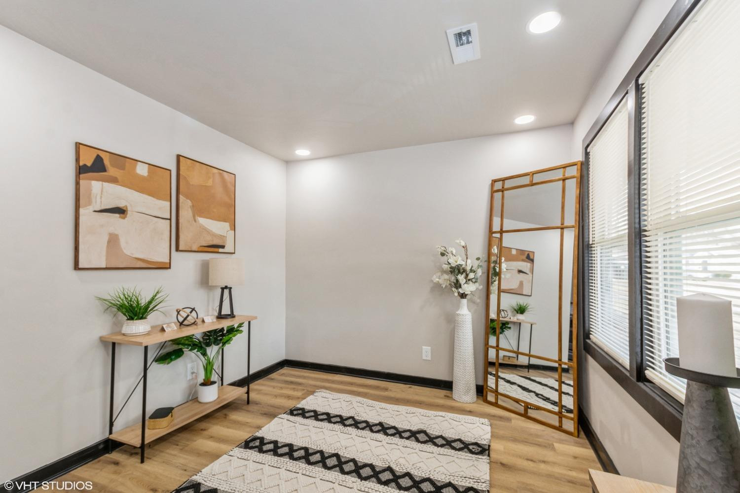 1103 Dearborn Circle Gary, IN 46403 - Photo 4 of 17 a view of an entryway with wooden floor