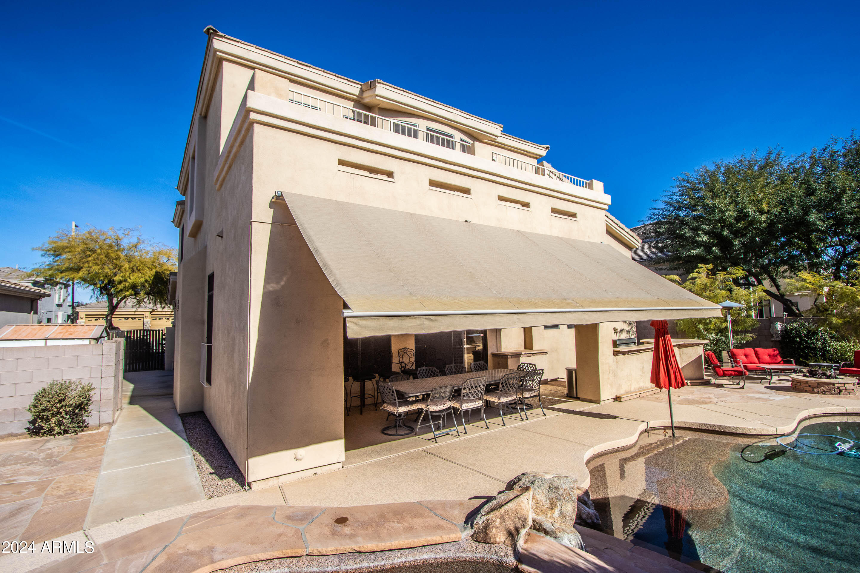 5237 East Hashknife Road Phoenix, AZ 85054 - Photo 22 of 26 Covered Patio w/Electrical Awning