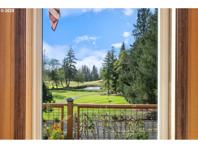 a view of swimming pool from a window