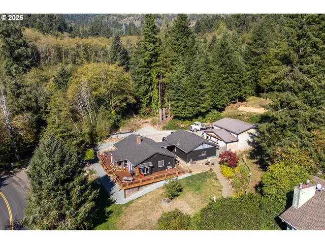 a view of a town with mountains in the background