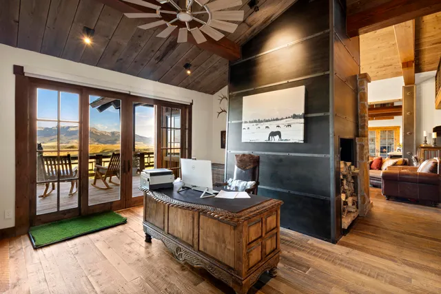 a spacious bedroom with a bed and window