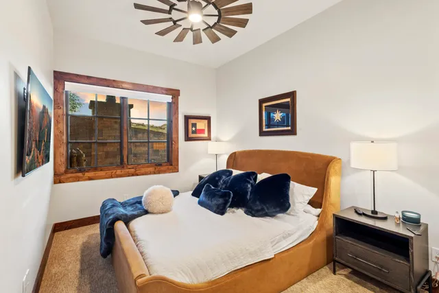 a view of a lake with houses in the back