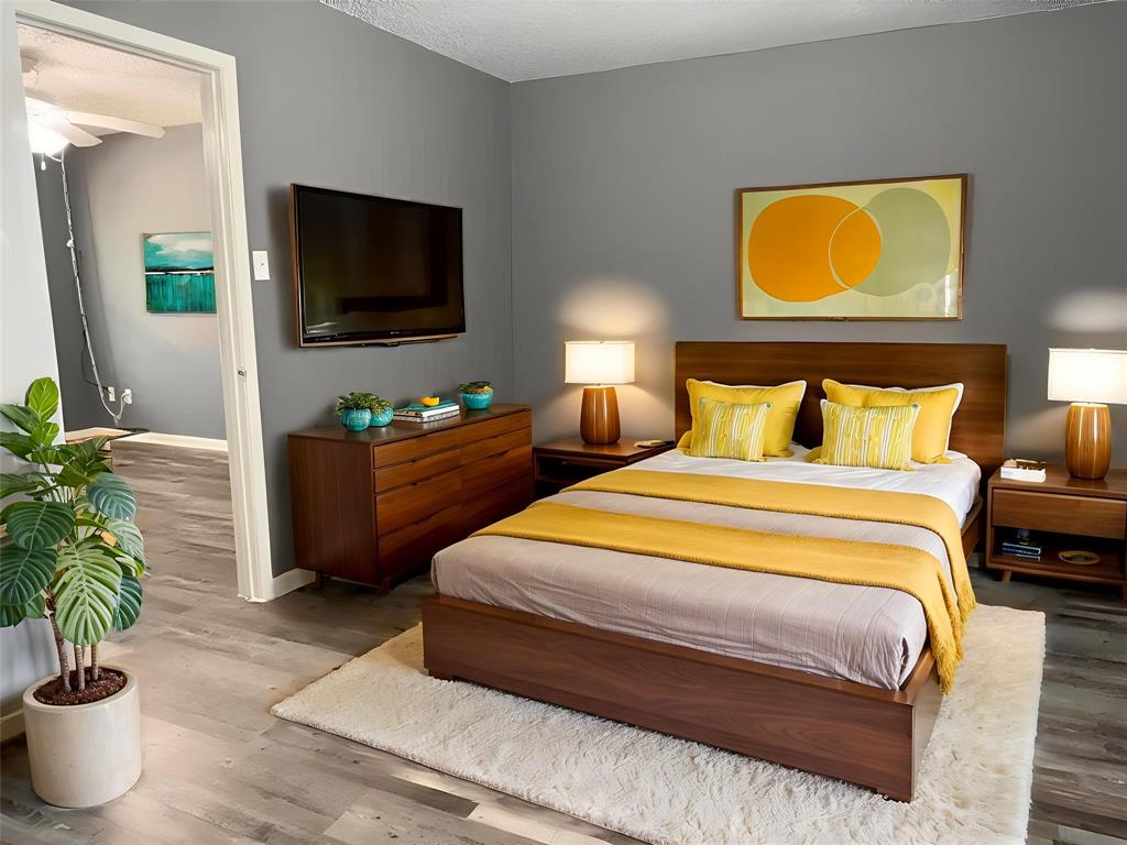 614 Stringer Street Killeen, TX 76541 - Photo 4 of 5 a bedroom with a bed and a potted plant