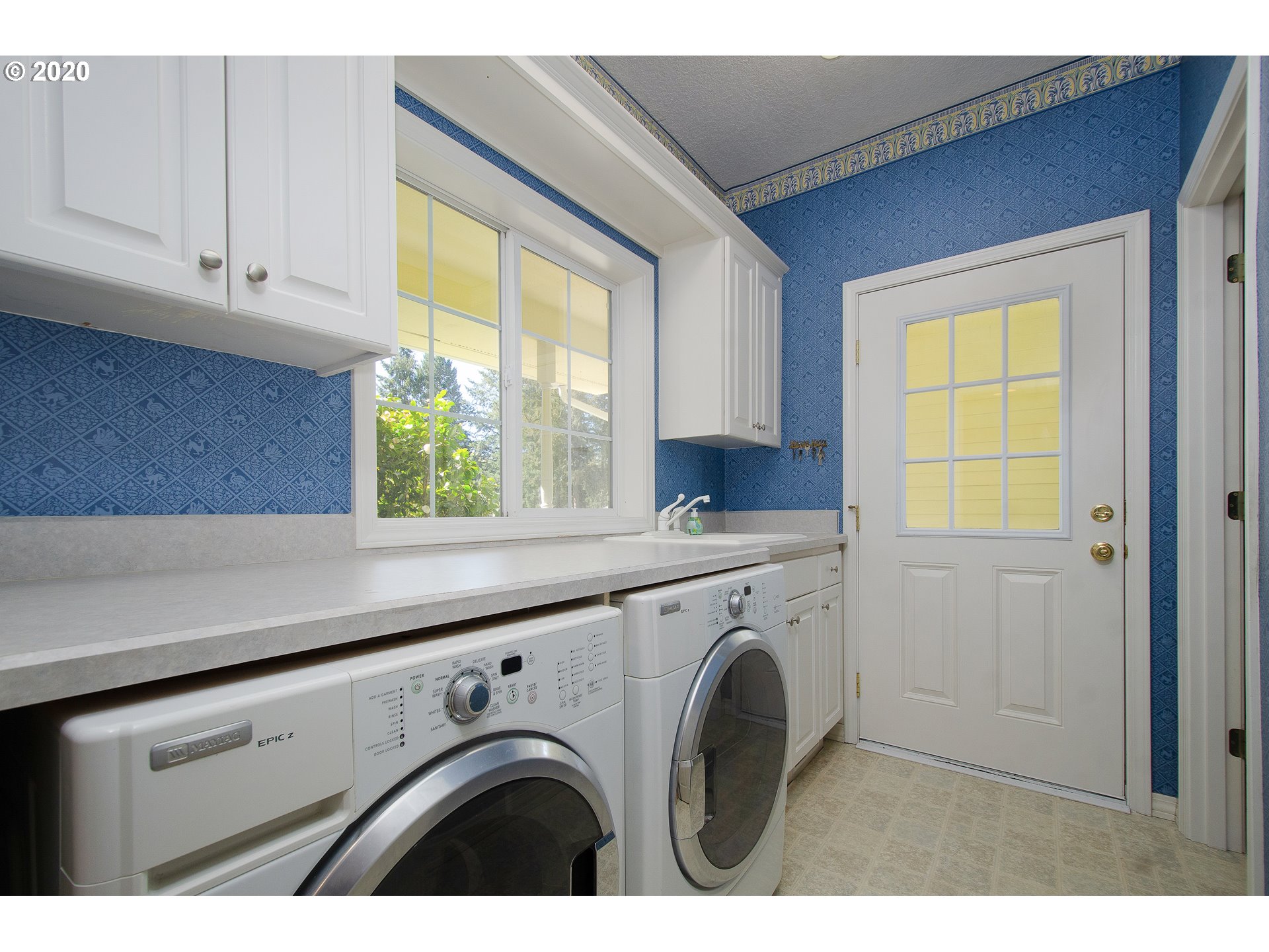 19303 Southeast Semple Road Damascus, OR 97089 - Photo 13 of 32 a utility room with dryer and washer