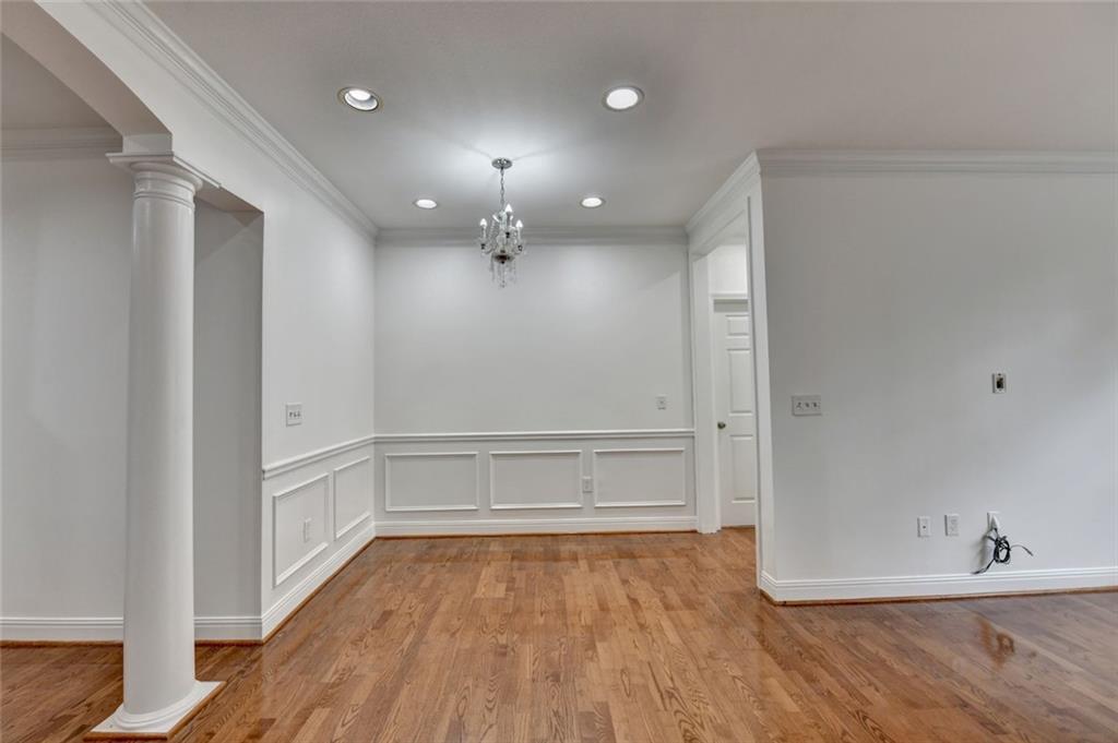 2202 Stratford Commons Decatur, GA 30033 - Photo 12 of 38 wooden floor in an empty room with a window