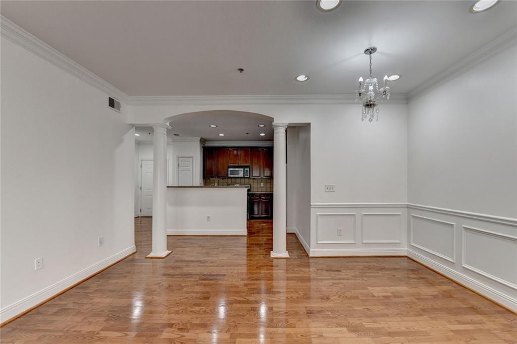 2202 Stratford Commons Decatur, GA 30033 - Photo 14 of 38 wooden floor in an empty room with a mirror