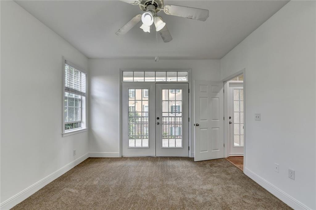 2202 Stratford Commons Decatur, GA 30033 - Photo 23 of 38 a view of an empty room with a window