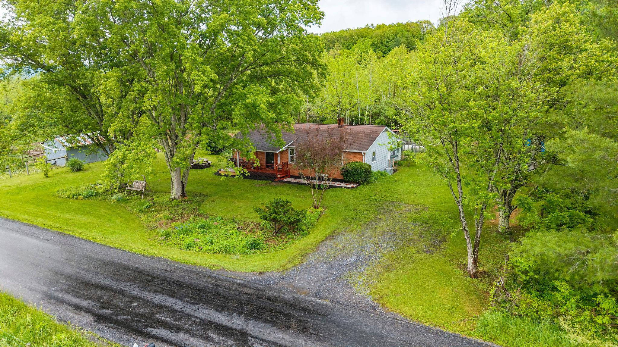3292 Deerfield Valley Road Deerfield, VA 24432 - Photo 58 of 69 a view of a back yard with a house