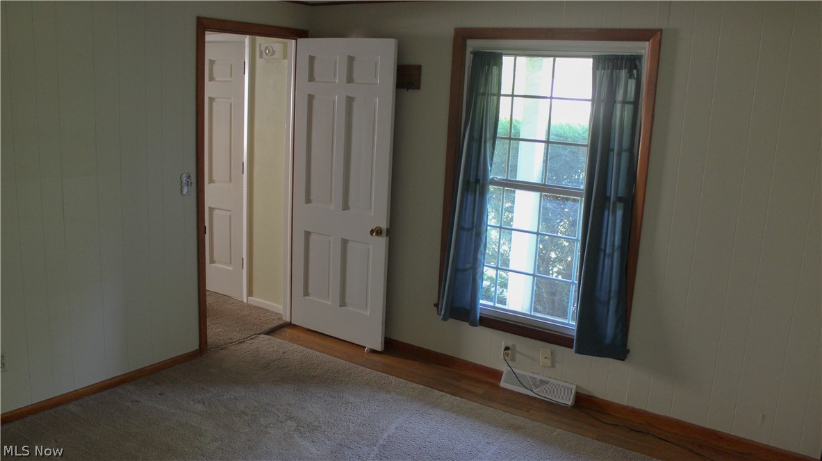 11910 West Lake Road Vermilion, OH 44089 - Photo 10 of 28 First floor Laundry area/ full bath