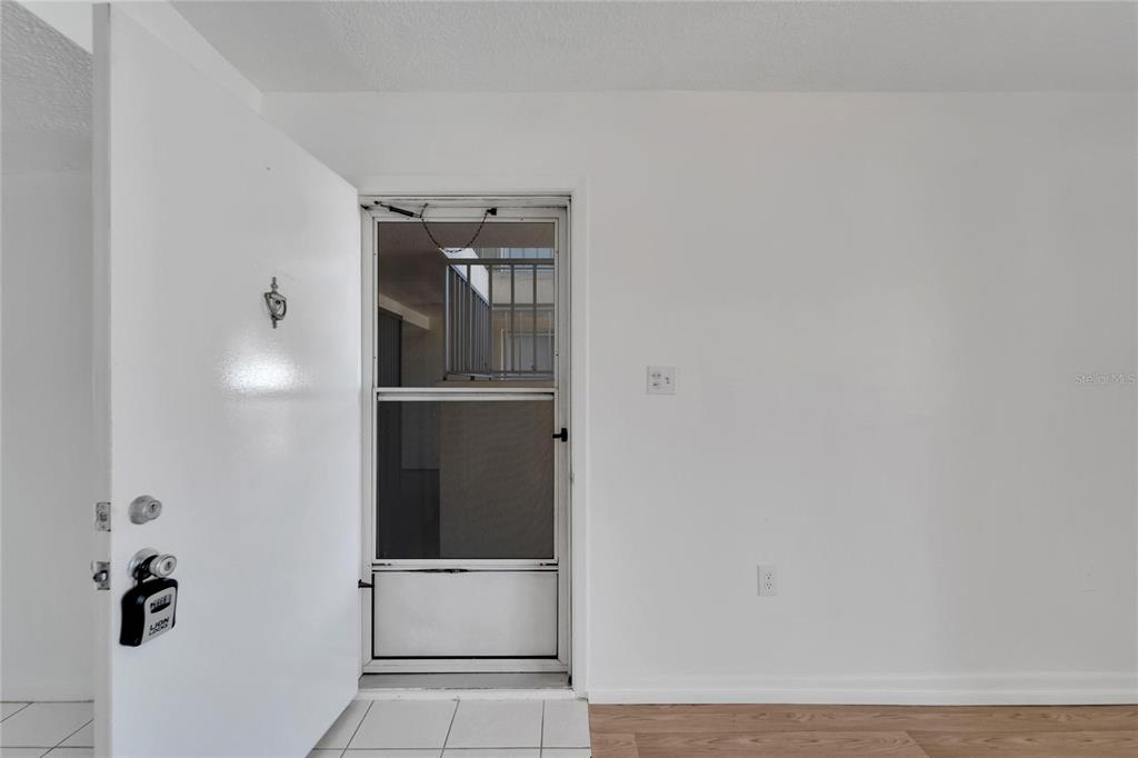 4600 Marine Parkway, Unit 104 New Port Richey, FL 34652 - Photo 15 of 69 a view of walk in closet with empty racks