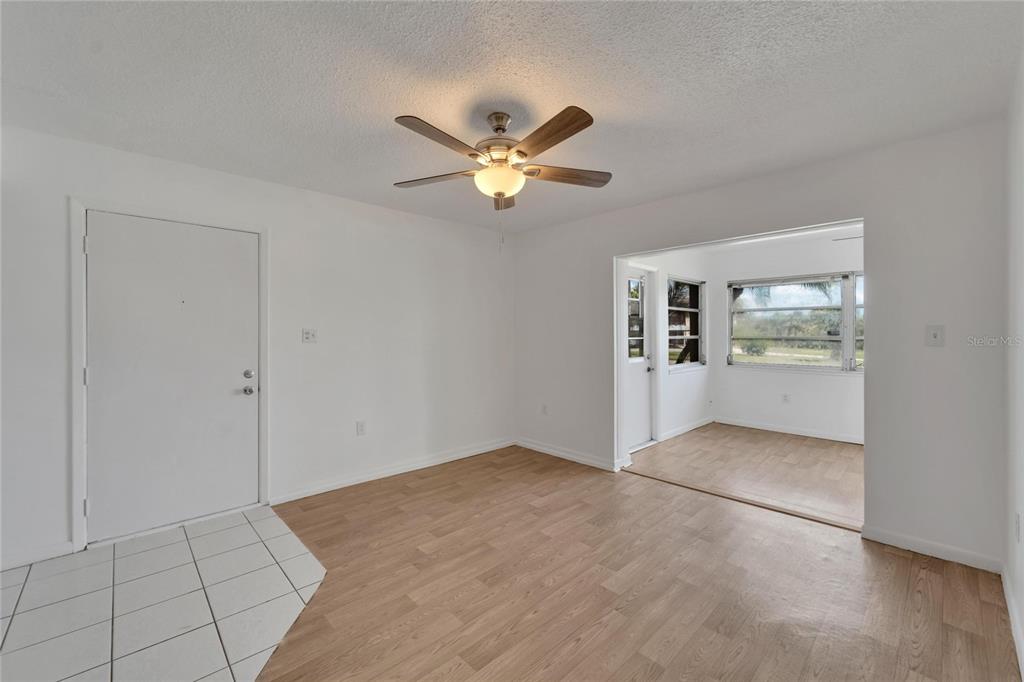 4600 Marine Parkway, Unit 104 New Port Richey, FL 34652 - Photo 17 of 69 wooden floor in an empty room with a window