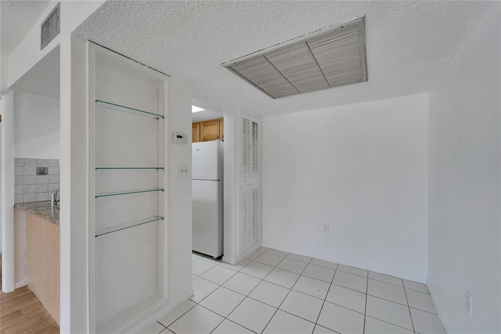 4600 Marine Parkway, Unit 104 New Port Richey, FL 34652 - Photo 21 of 69 a view of walk in closet with empty racks