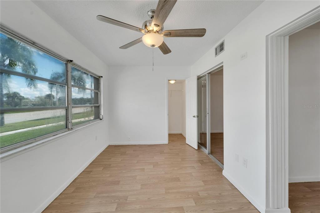 4600 Marine Parkway, Unit 104 New Port Richey, FL 34652 - Photo 31 of 69 wooden floor in an empty room with a window