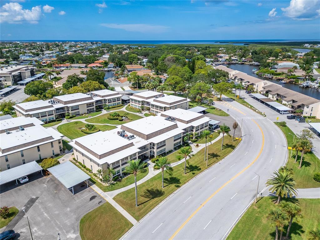 4600 Marine Parkway, Unit 104 New Port Richey, FL 34652 - Photo 52 of 69 an aerial view of a house with a ocean view