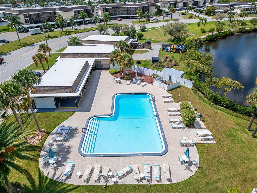 4600 Marine Parkway, Unit 104 New Port Richey, FL 34652 - Photo 66 of 69 swimming pool view with a garden and seating space