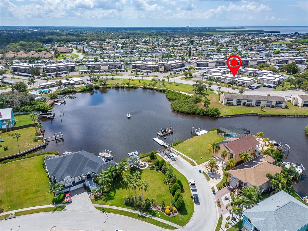 4600 Marine Parkway, Unit 104 New Port Richey, FL 34652 - Photo 69 of 69 an aerial view of residential houses with outdoor space and outdoor seating