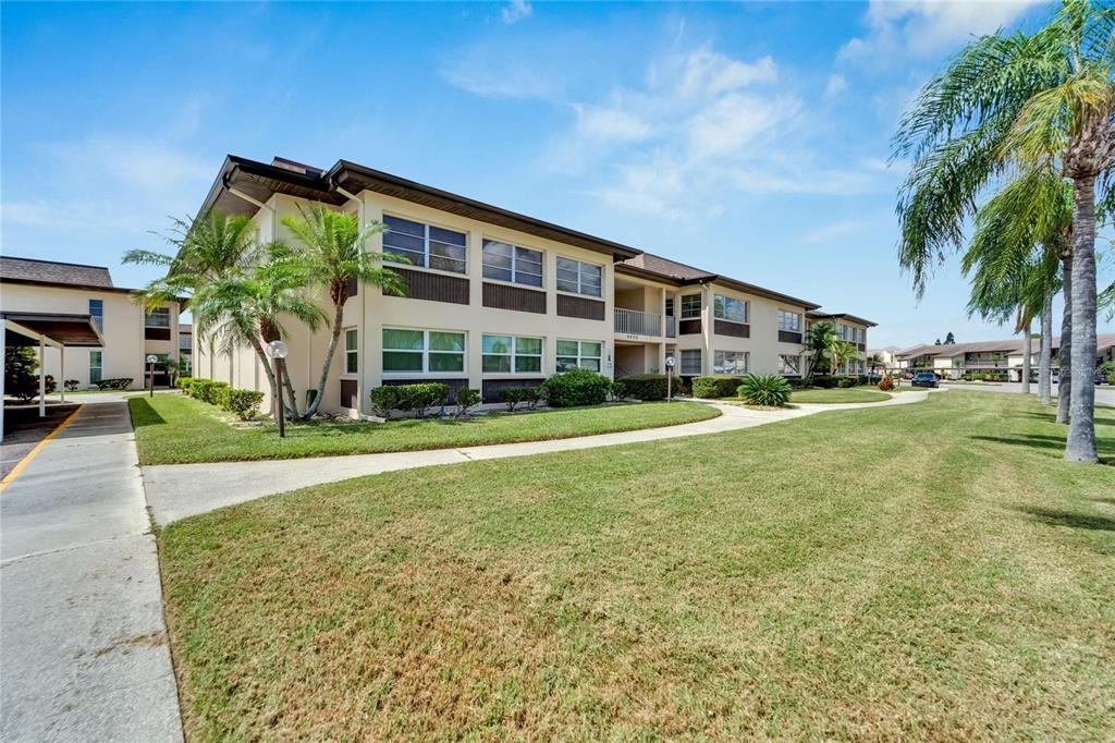 4600 Marine Parkway, Unit 104 New Port Richey, FL 34652 - Photo 8 of 69 a view of a house with a yard