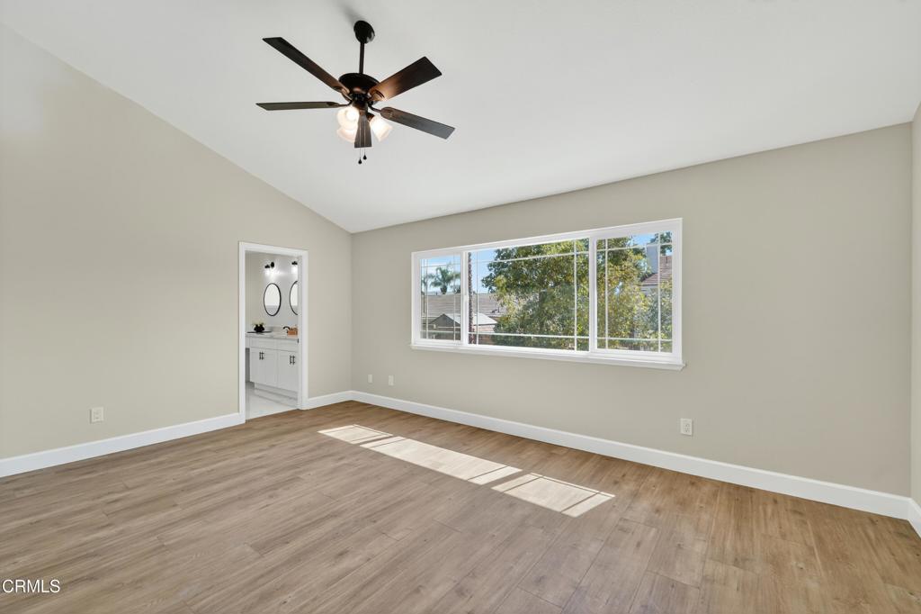 2848 Jadestone Avenue Simi Valley, CA 93063 - Photo 15 of 31 wooden floor in an empty room with a window