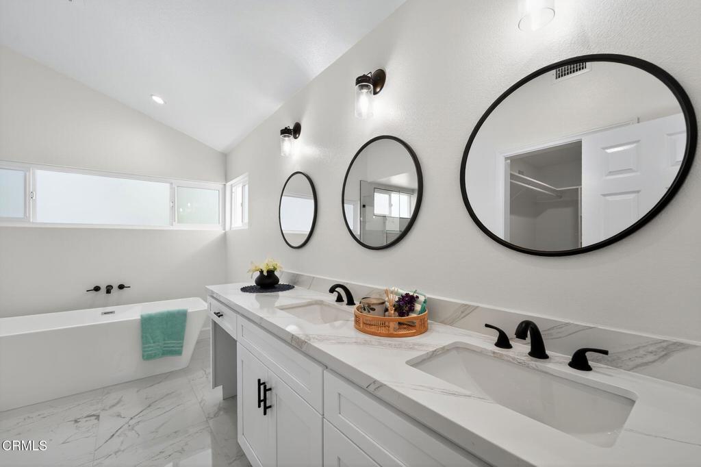 2848 Jadestone Avenue Simi Valley, CA 93063 - Photo 21 of 31 a bathroom with a sink and a mirror