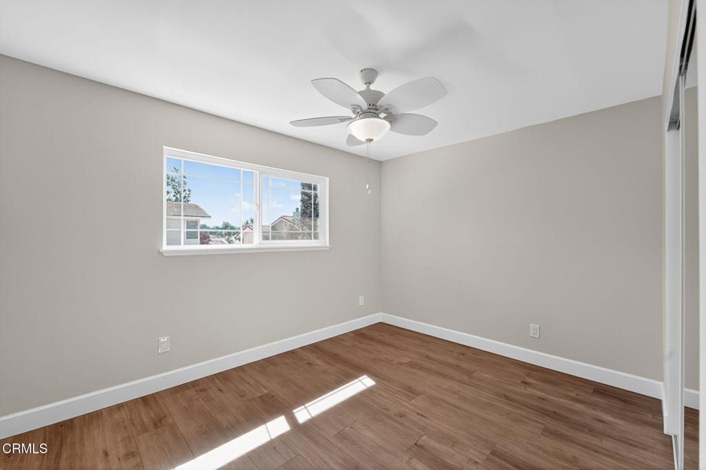 2848 Jadestone Avenue Simi Valley, CA 93063 - Photo 22 of 31 a view of empty room with wooden floor