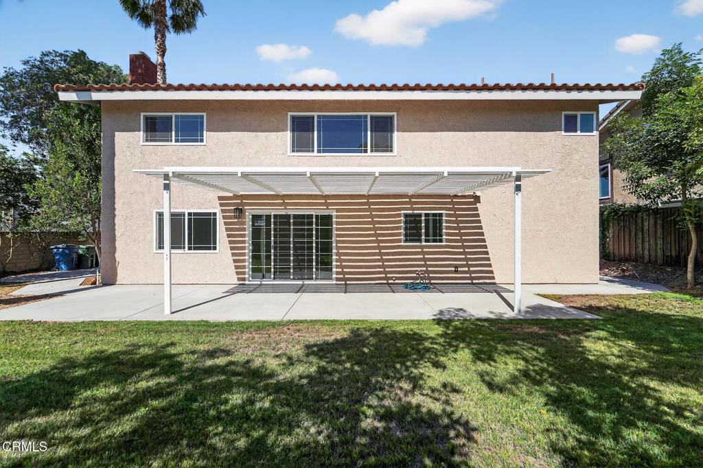 2848 Jadestone Avenue Simi Valley, CA 93063 - Photo 30 of 31 a house that has a big yard in front of it