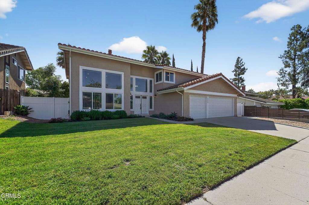 2848 Jadestone Avenue Simi Valley, CA 93063 - Photo 3 of 31 a front view of house with yard and trees
