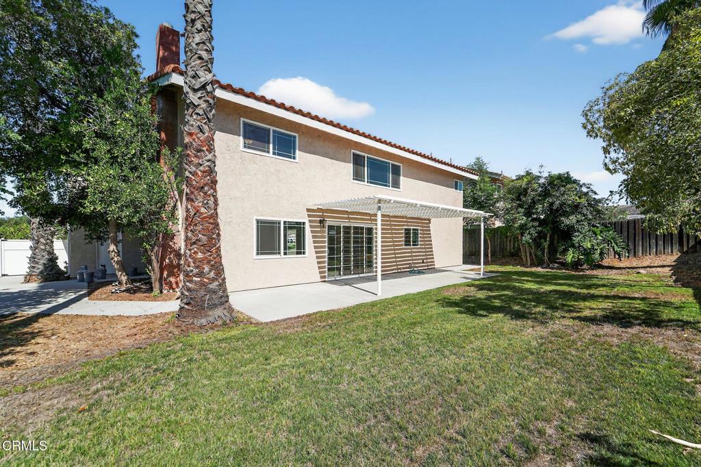 2848 Jadestone Avenue Simi Valley, CA 93063 - Photo 31 of 31 a front view of a house with a yard