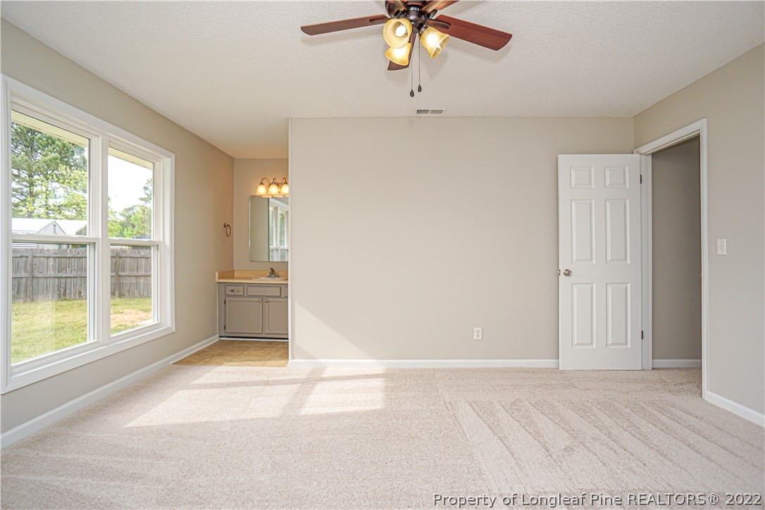 974 Rim Road Fayetteville, NC 28314 - Photo 27 of 40 a view of an empty room with a window
