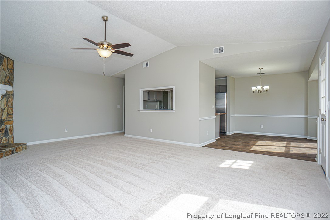 974 Rim Road Fayetteville, NC 28314 - Photo 8 of 40 a view of an empty room with a window