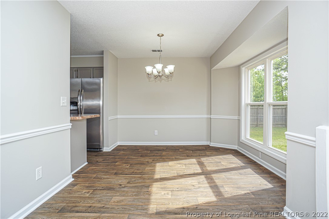 974 Rim Road Fayetteville, NC 28314 - Photo 10 of 40 a view of an empty room with a window