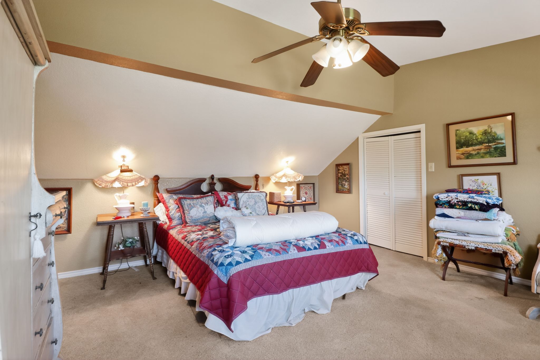 950 Ater Ranch Estates Bertram, TX 78605 - Photo 11 of 40 a bedroom with bed and a chandelier