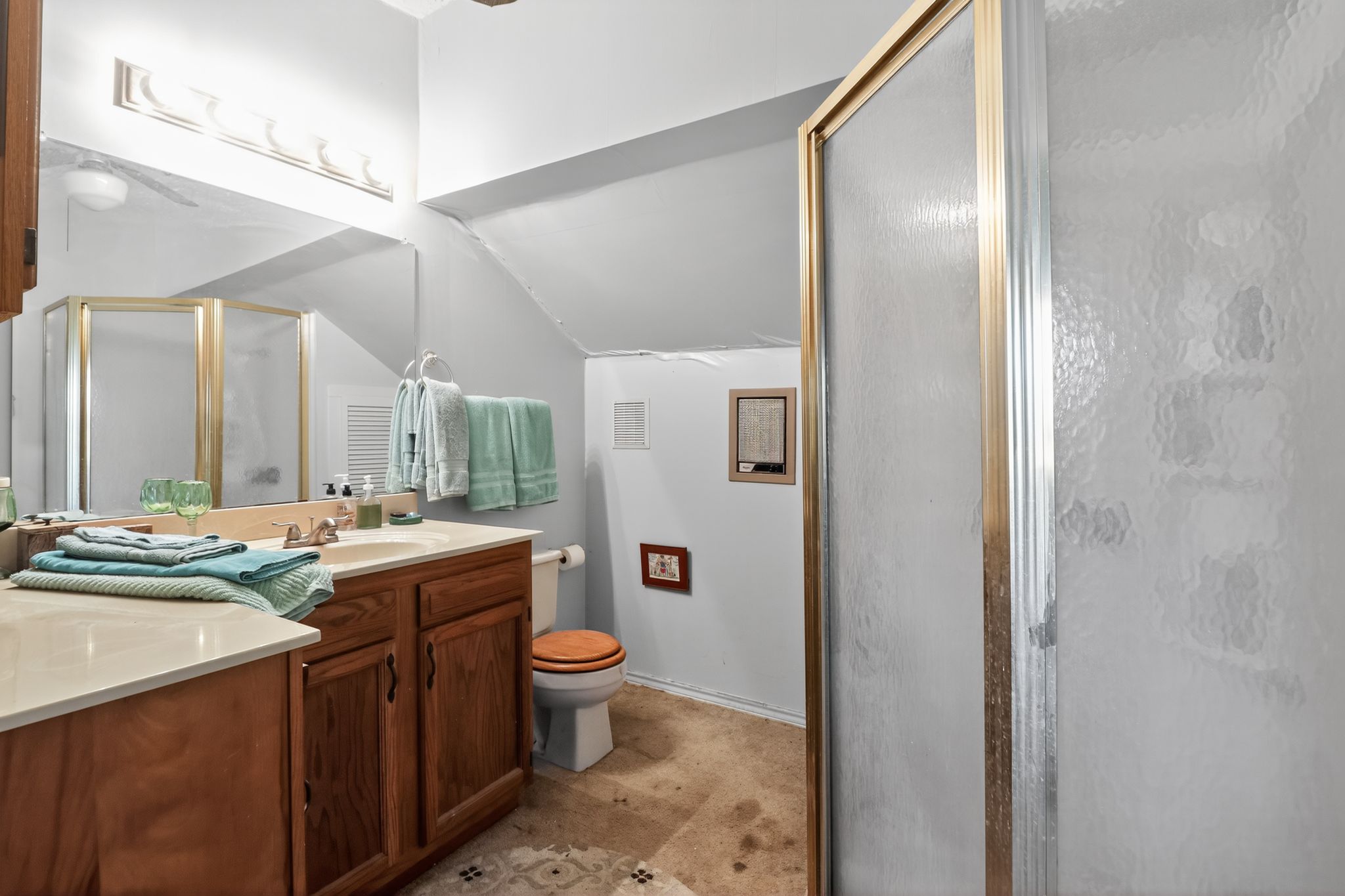950 Ater Ranch Estates Bertram, TX 78605 - Photo 13 of 40 a bathroom with a granite countertop sink toilet and shower
