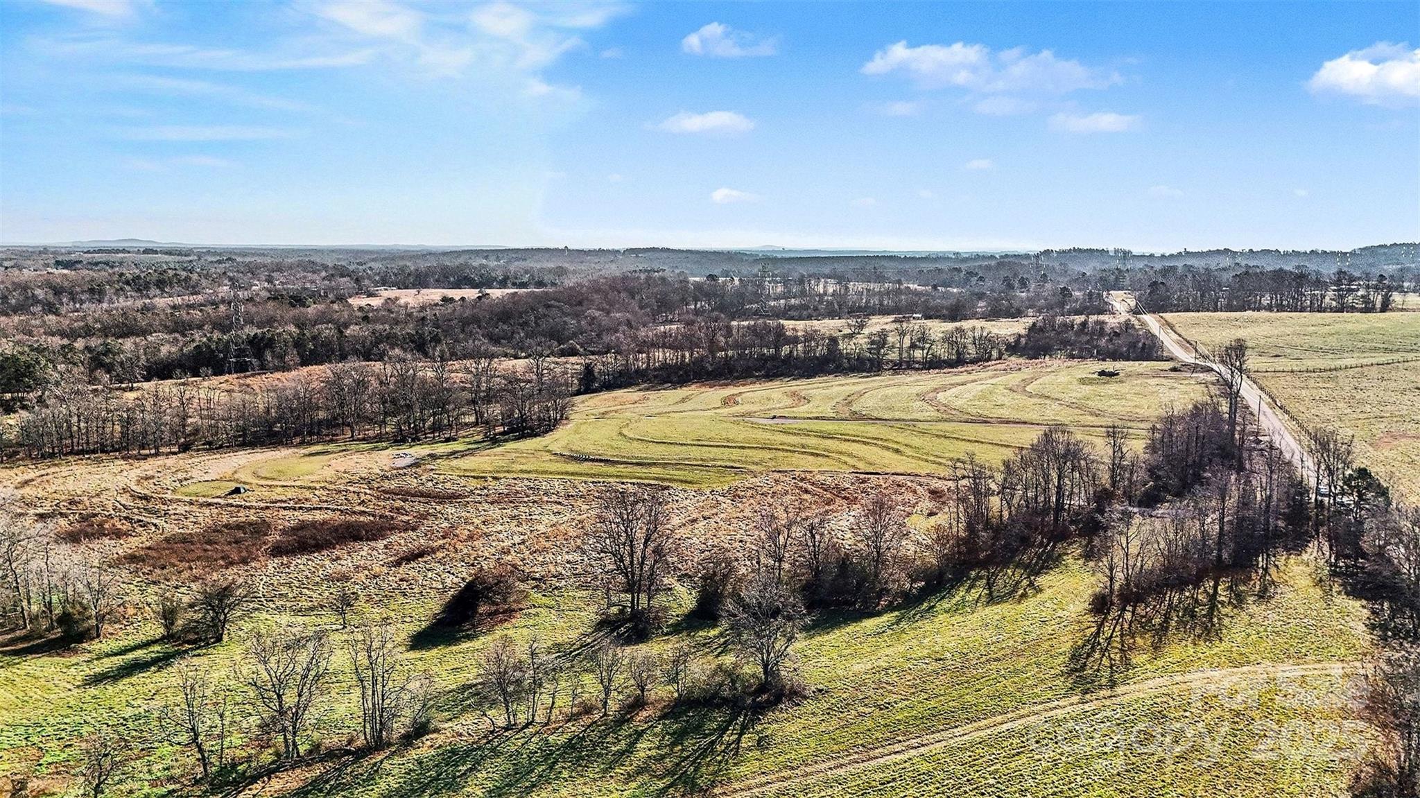 498 Carolina Ridge Road Gaffney, SC 29341 - Photo 8 of 17 a view of a swimming pool with an ocean view