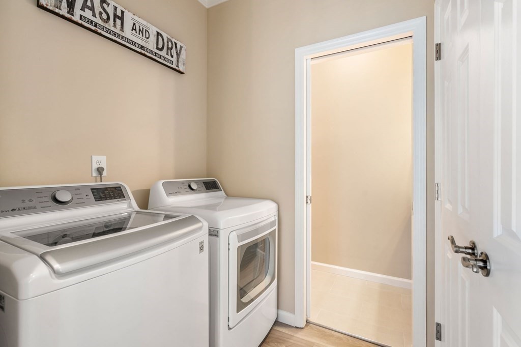1 Elm Street, Unit 4 Boston, MA 02122 - Photo 13 of 15 a utility room with dryer and washer