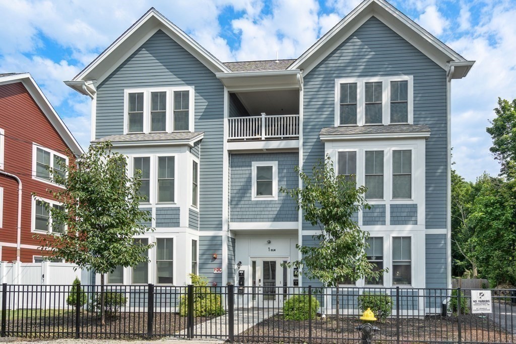 1 Elm Street, Unit 4 Boston, MA 02122 - Photo 14 of 15 a front view of a house with glass windows
