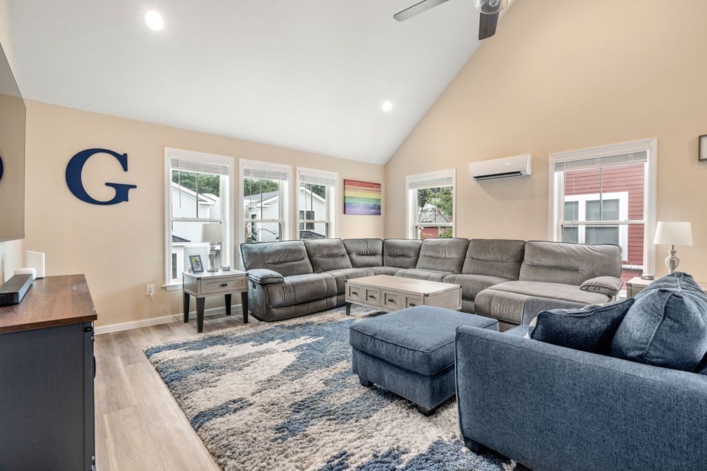 1 Elm Street, Unit 4 Boston, MA 02122 - Photo 3 of 15 a living room with furniture wooden floor and window
