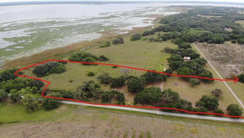 Tohopekaliga Rd Street St. Cloud, FL 34772 - Photo 1 of 1 an aerial view of ocean beach and residential house with swimming pool