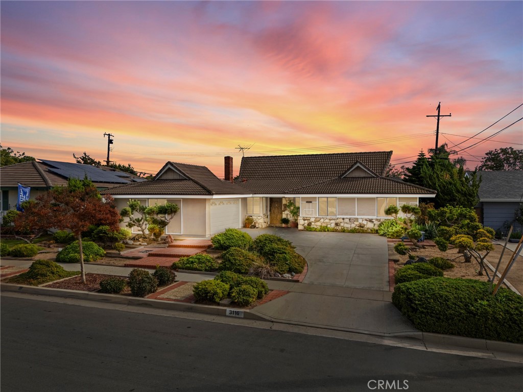 a view of a street with houses