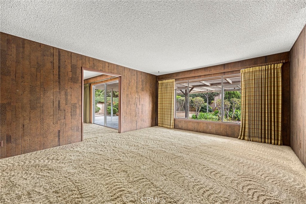 3116 Firethorne Avenue Fullerton, CA 92835 - Photo 12 of 32 a view of a big room with windows and front door