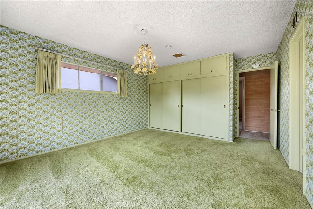 3116 Firethorne Avenue Fullerton, CA 92835 - Photo 15 of 32 en empty room with a door