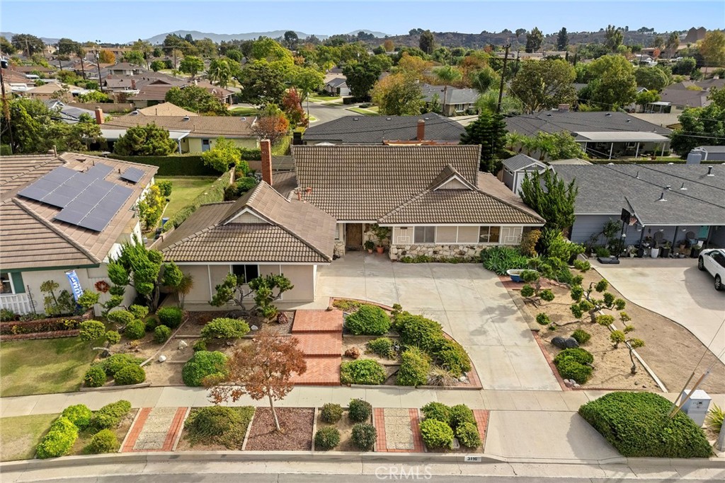 3116 Firethorne Avenue Fullerton, CA 92835 - Photo 29 of 32 an aerial view of multiple houses with a yard