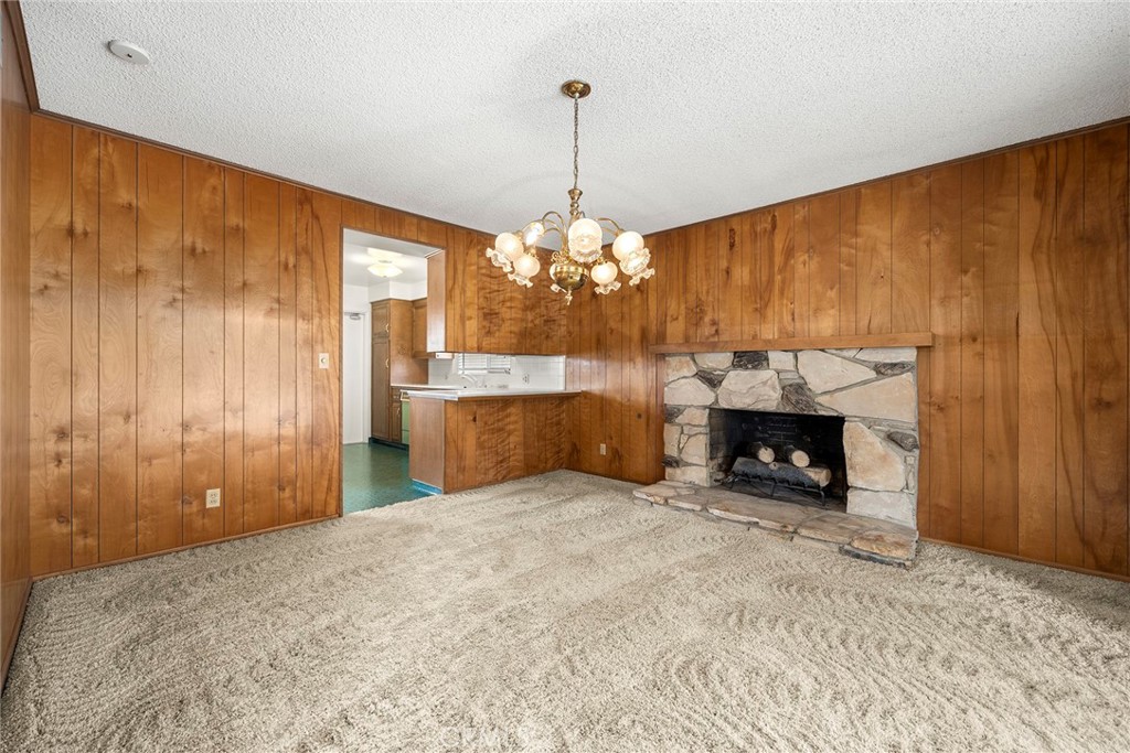 3116 Firethorne Avenue Fullerton, CA 92835 - Photo 3 of 32 a view of a room with a fireplace and window