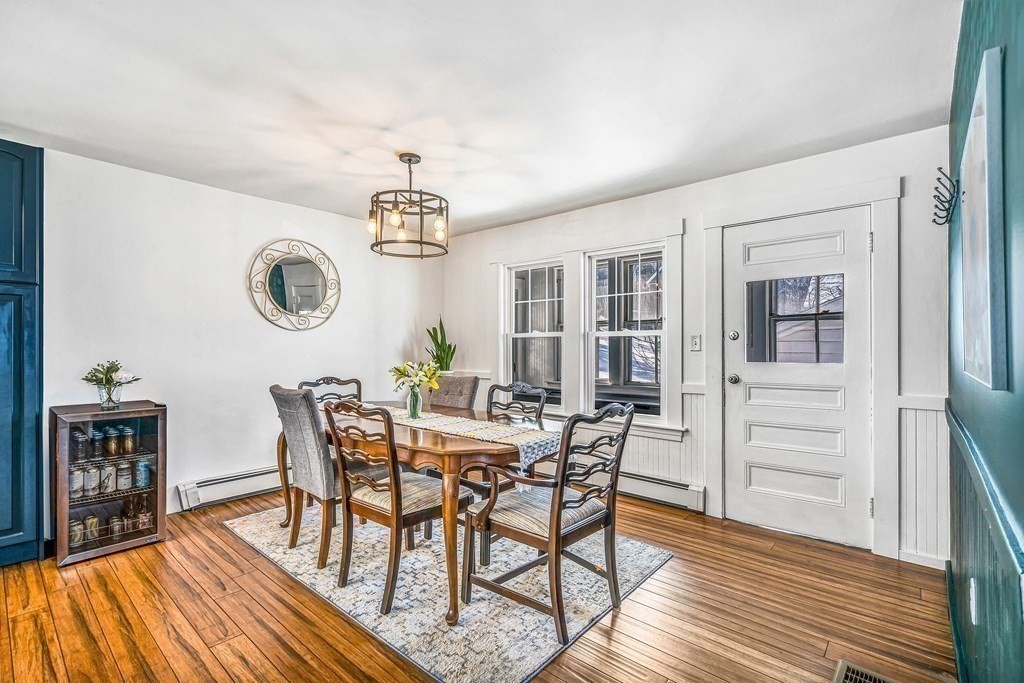 37 Acre Street Clinton, MA 01510 - Photo 20 of 38 a view of a dining room with furniture and wooden floor