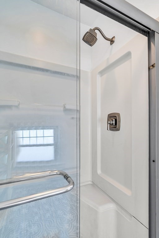 37 Acre Street Clinton, MA 01510 - Photo 28 of 38 a bathroom with a tub and a shower