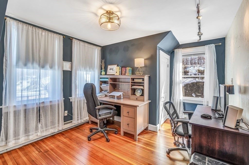 37 Acre Street Clinton, MA 01510 - Photo 31 of 38 a view of a workspace with furniture and a window