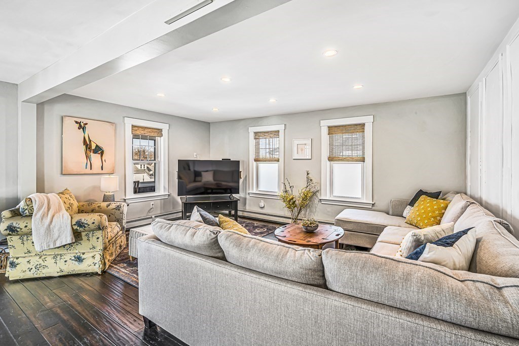 37 Acre Street Clinton, MA 01510 - Photo 8 of 38 a living room with furniture and a flat screen tv