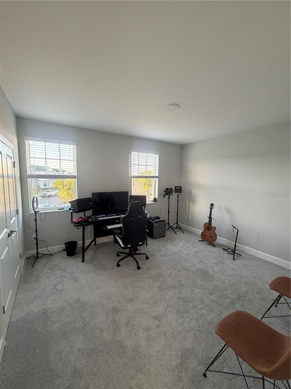 1389 Lumpini Street St. Cloud, FL 34771 - Photo 18 of 32 a living room with furniture and a window