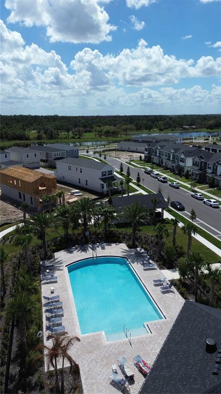 1389 Lumpini Street St. Cloud, FL 34771 - Photo 32 of 32 an aerial view of a garden