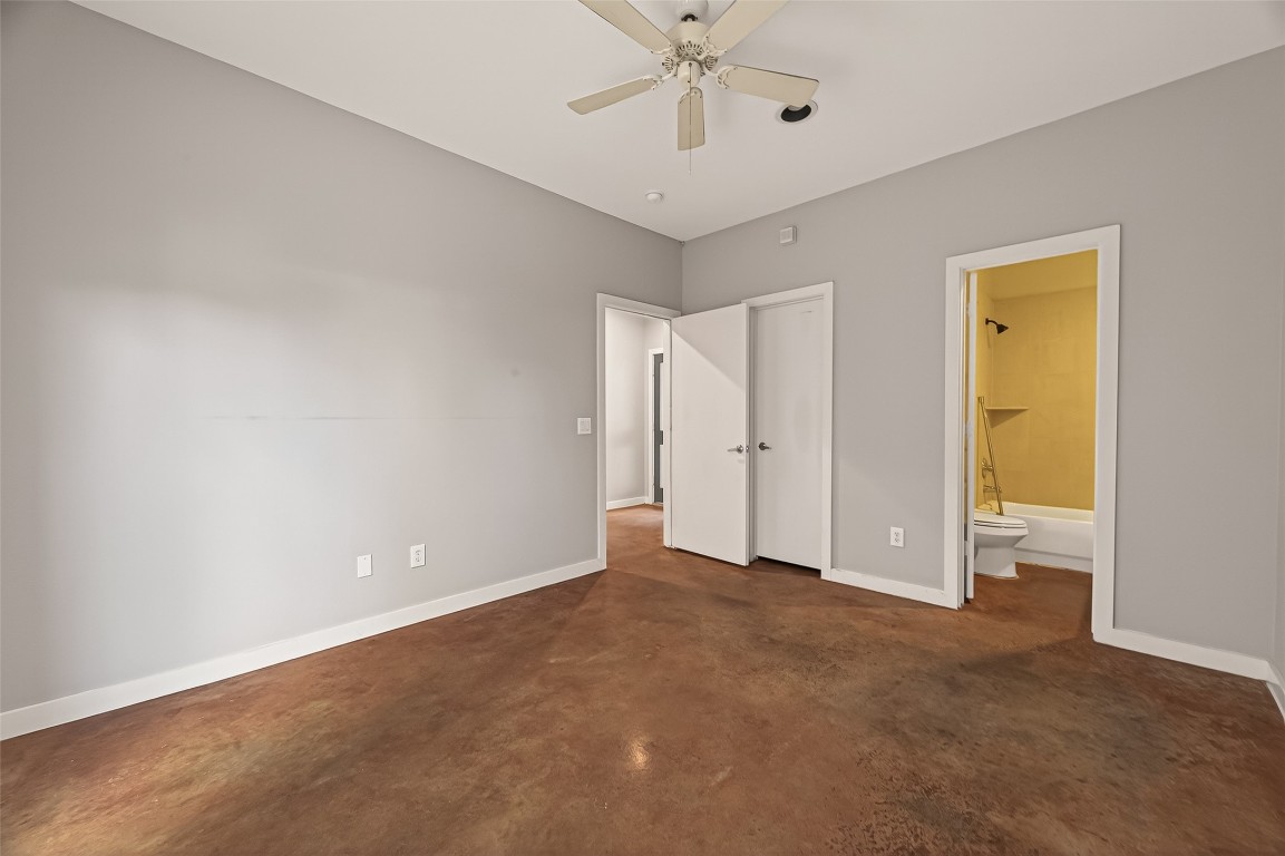 1112 Columbus Street, Unit B Houston, TX 77019 - Photo 14 of 31 a view of an empty room and chandelier fan