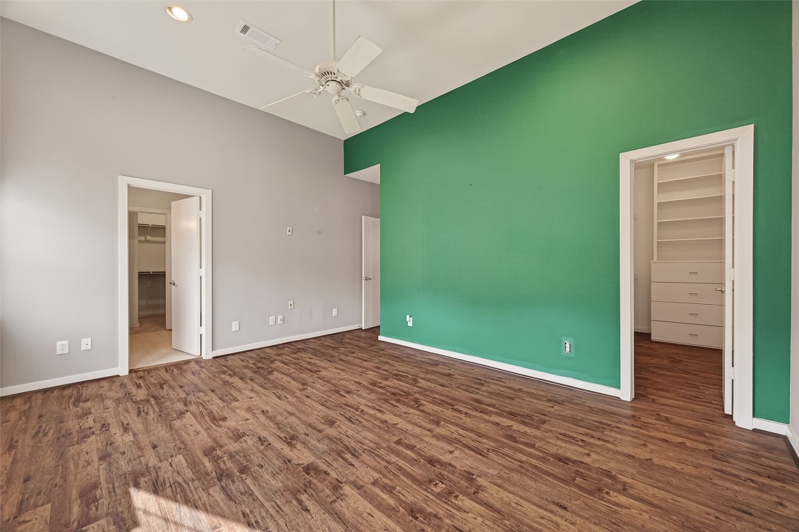 1112 Columbus Street, Unit B Houston, TX 77019 - Photo 23 of 31 wooden floor in an empty room with a window